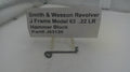 Smith & Wesson Revolver J Frame Model 63 .22 LR Hammer Block on a white surface with a label.