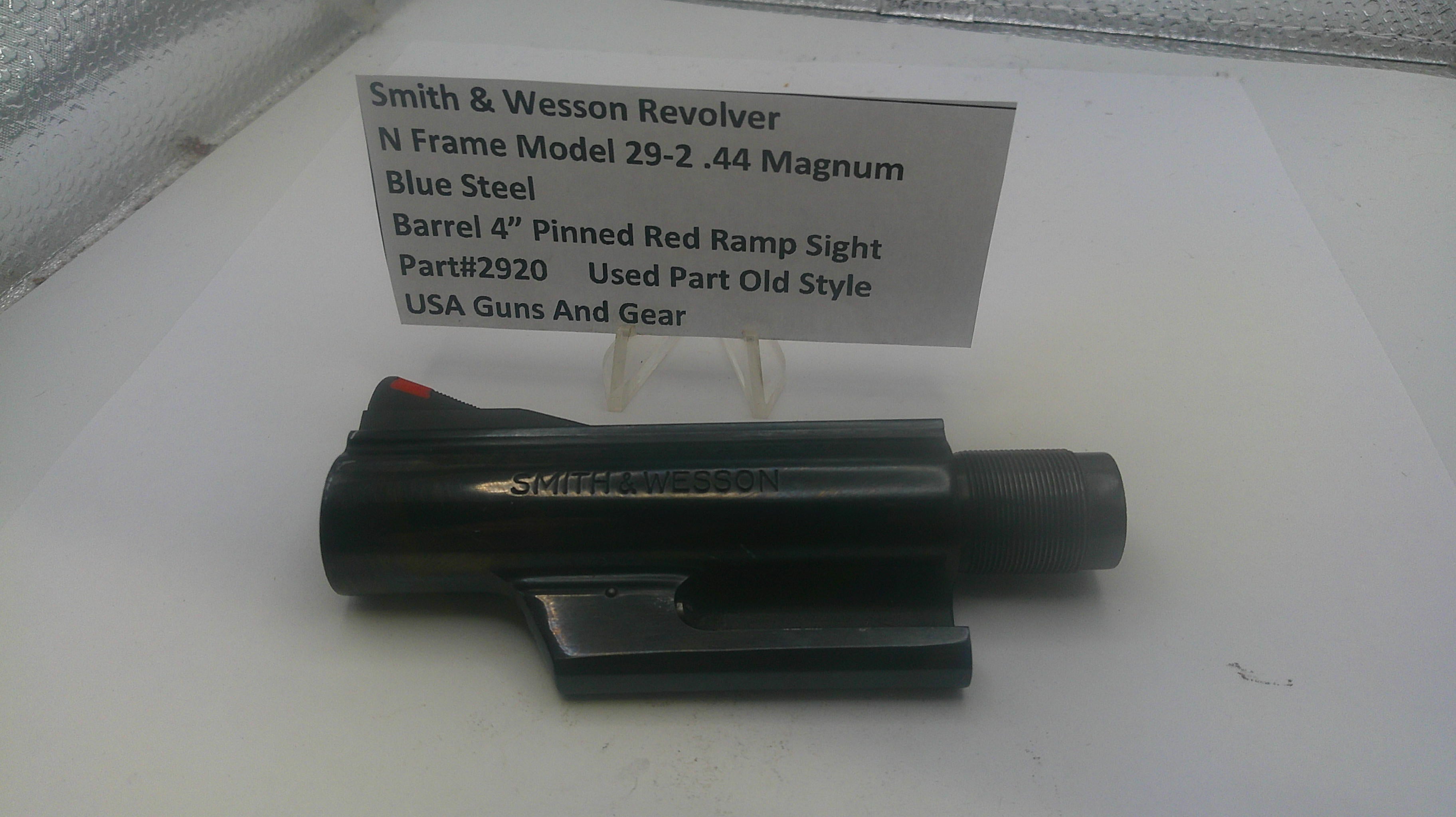 Smith & Wesson revolver on a white surface with a label detailing specifications.