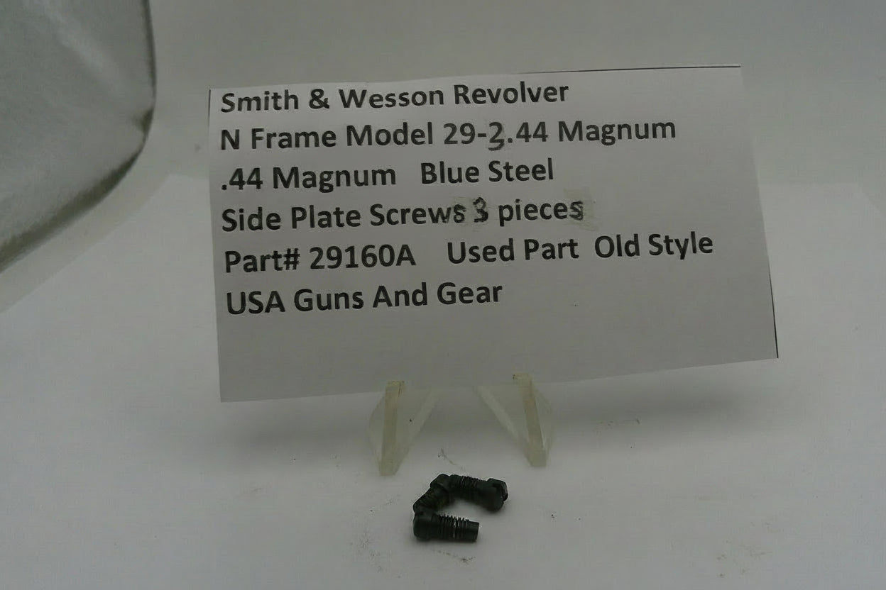 Smith & Wesson revolver parts with a label on a white background