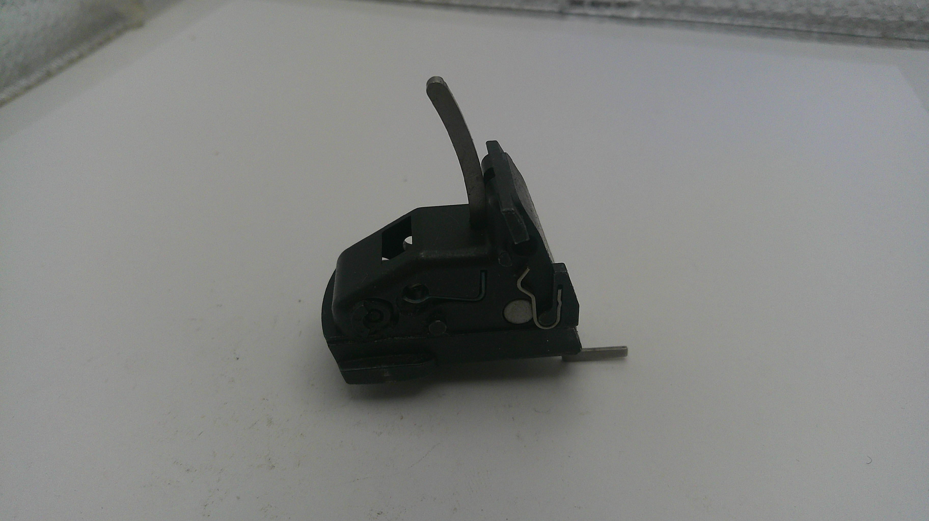 Small mechanical component on a white surface