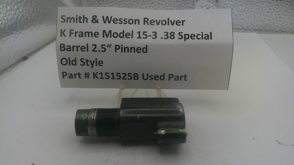 Smith & Wesson revolver barrel with descriptive label on a white surface