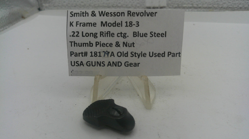 Smith & Wesson revolver part on display with a descriptive sign.