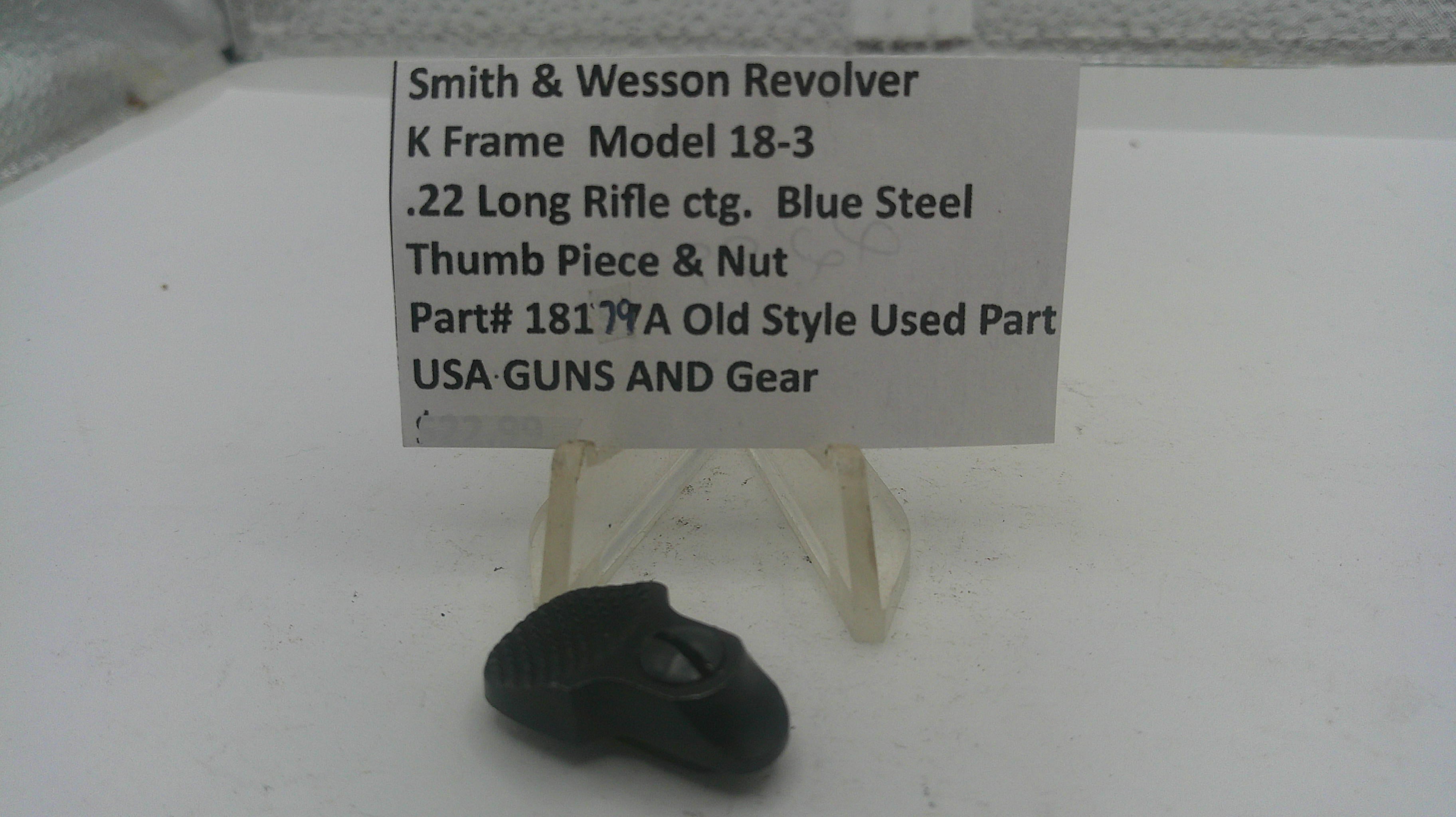 Smith & Wesson revolver part on display with a descriptive sign.