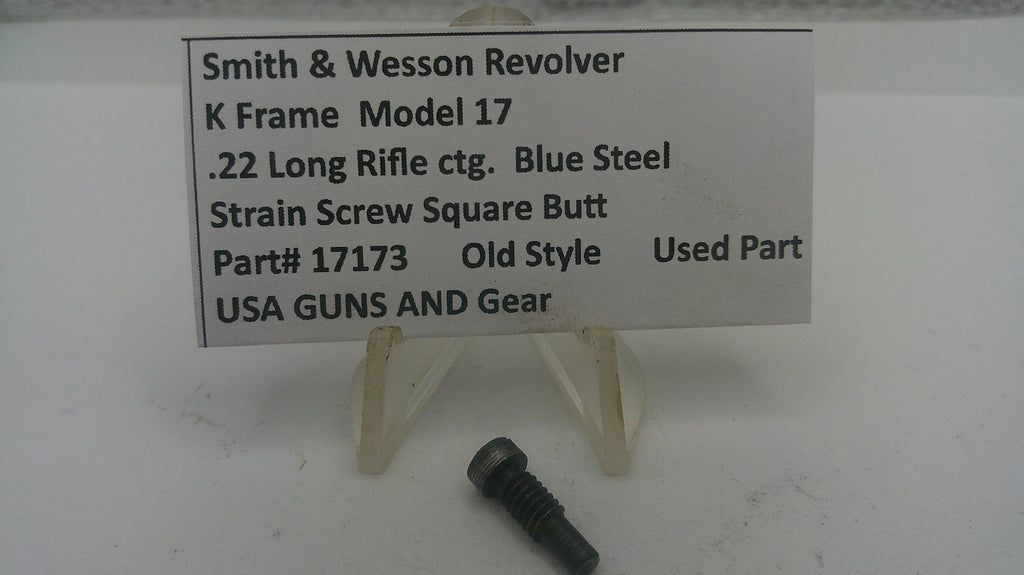 Smith & Wesson revolver part with descriptive sign on a white background