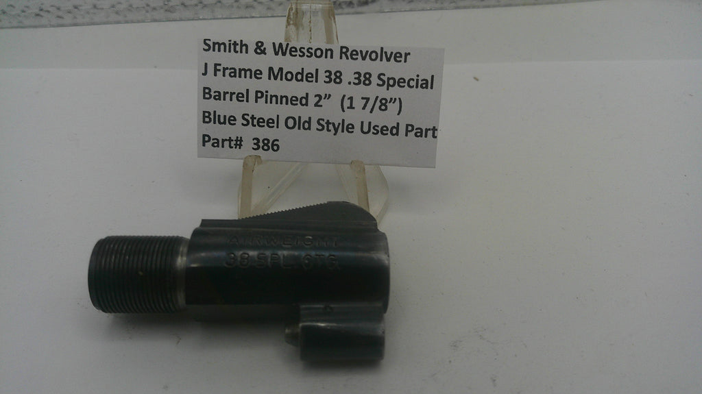 Smith & Wesson revolver barrel on a white background with a label.