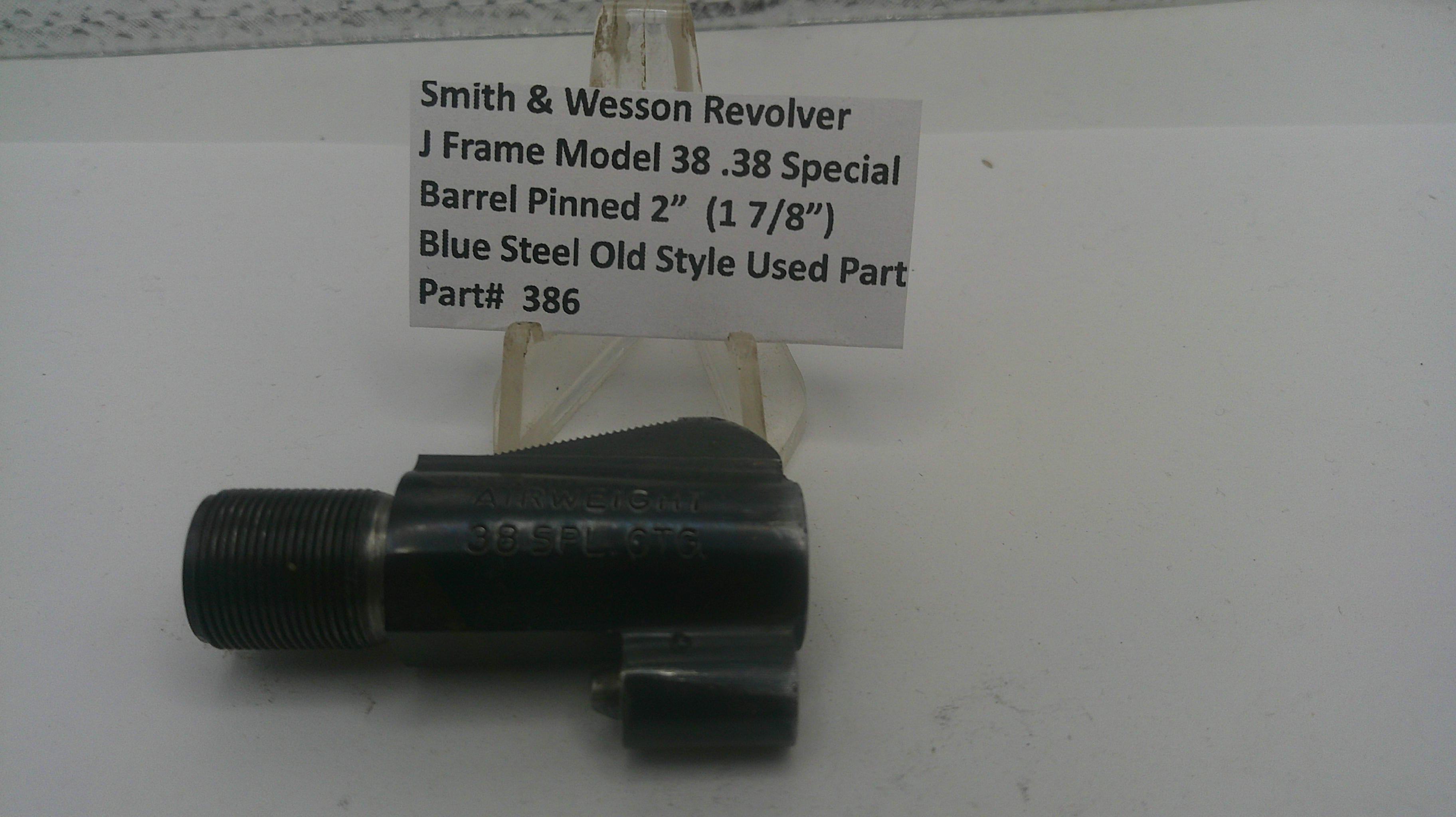 Smith & Wesson revolver barrel on a white background with a label.