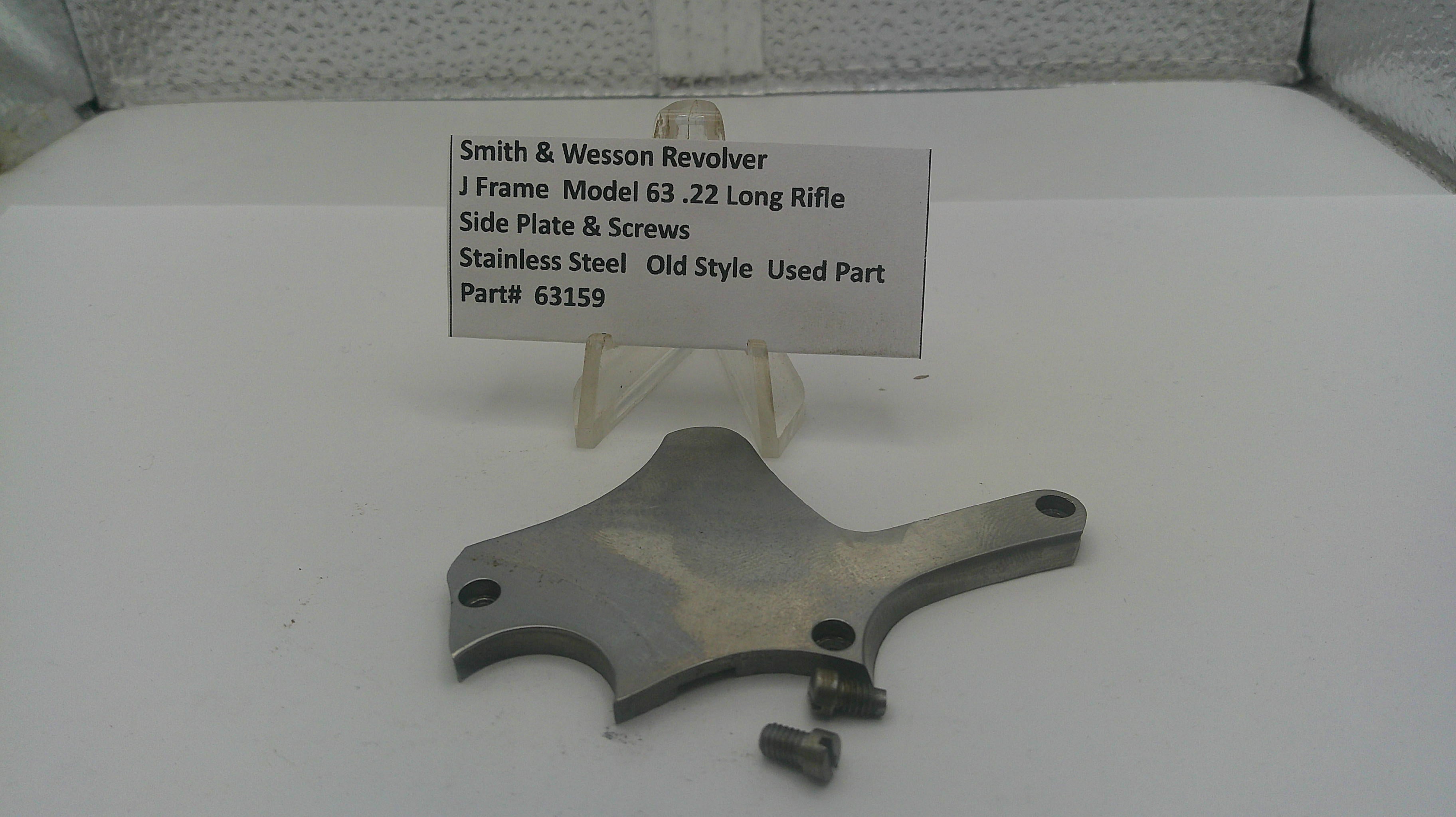 Metal component with a label on a white surface