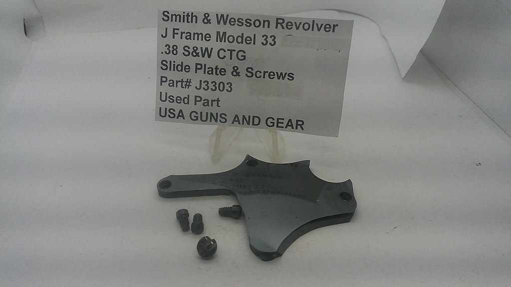 Smith & Wesson Model 33 side plate and four screws with identification label. Inventory reference J3303.