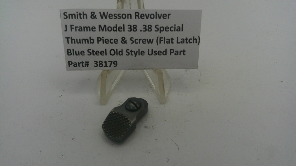 Small black metal component with descriptive label on a white background