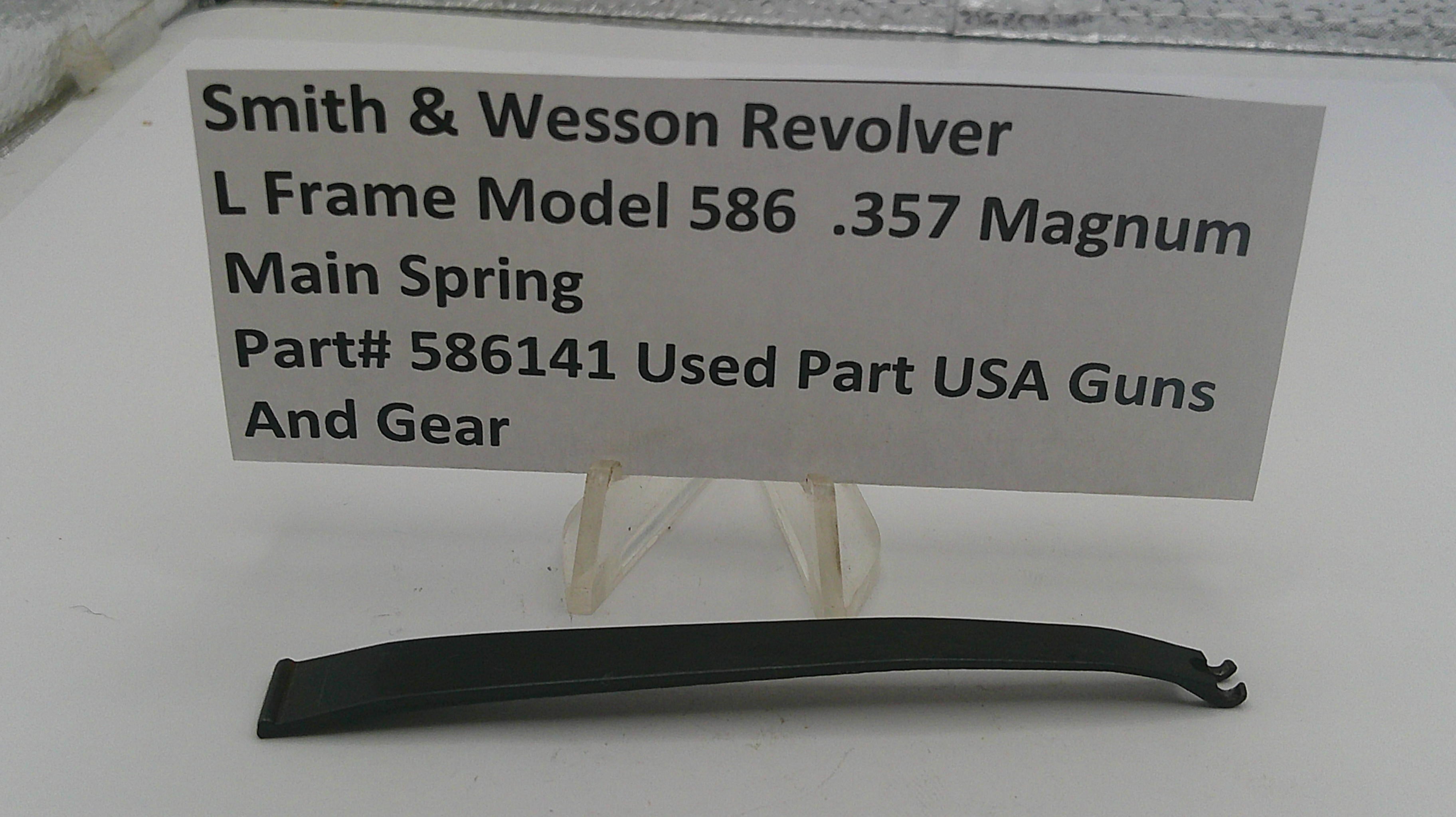 Smith & Wesson revolver main spring with a label on a white background