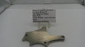 Smith & Wesson revolver part on a white surface with a label