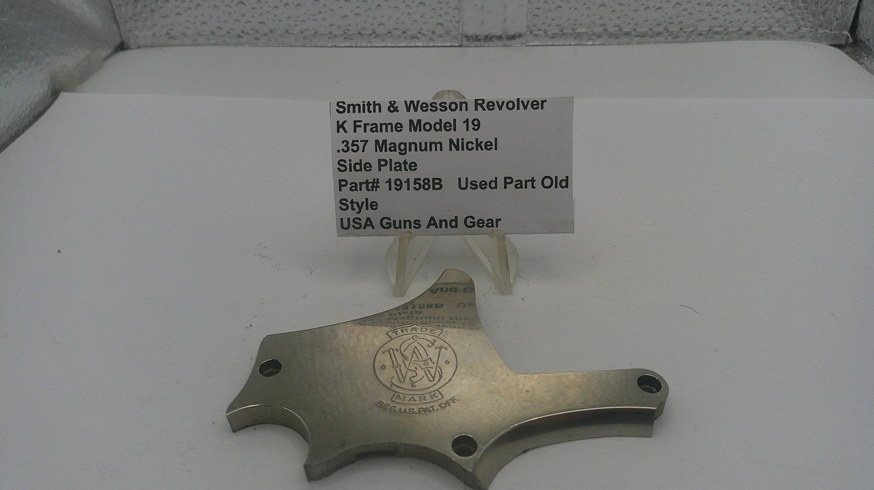 Smith & Wesson revolver part on a white surface with a label