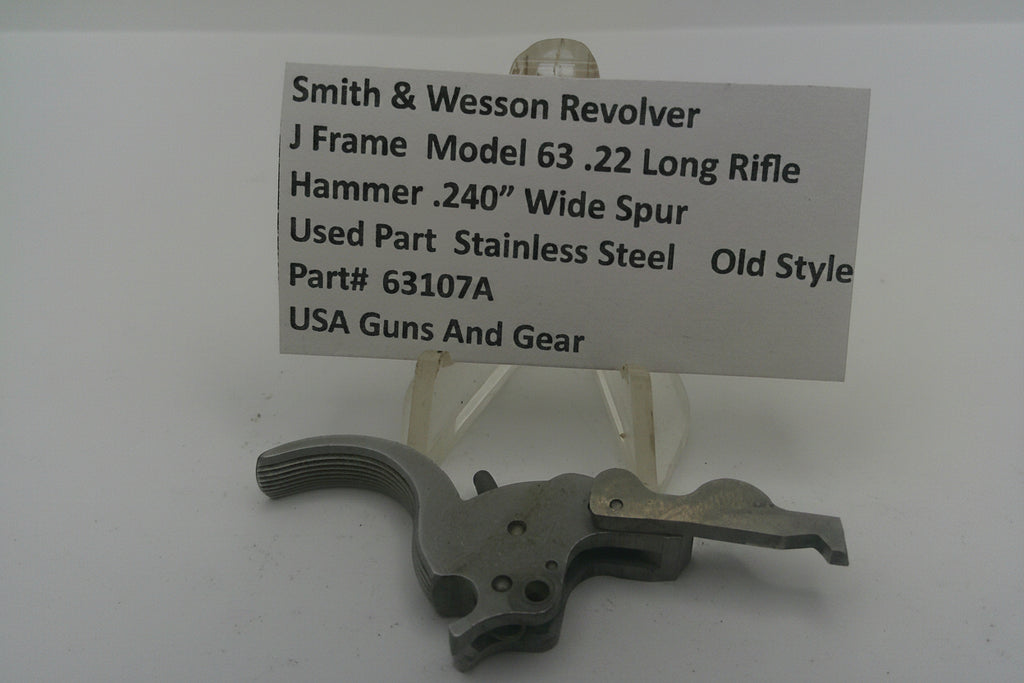 Smith & Wesson revolver part on a stand with descriptive label