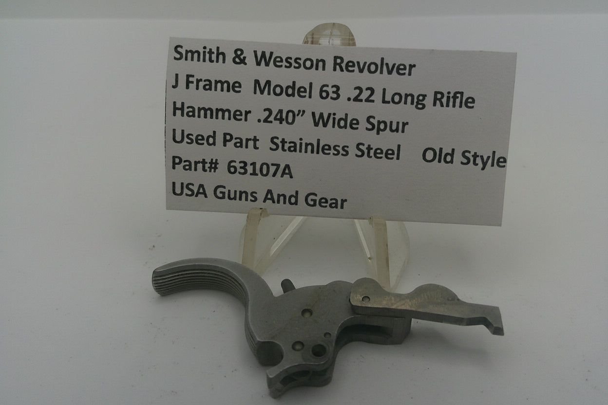 Smith & Wesson revolver part on a stand with descriptive label