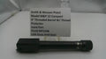 Smith & Wesson pistol barrel with a label on a white background