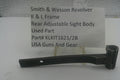 A used black metal sight body part for a Smith & Wesson revolver, displayed on a small stand in front of a white card with product details.