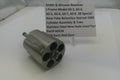 Smith & Wesson revolver cylinder assembly on a white surface with a label.