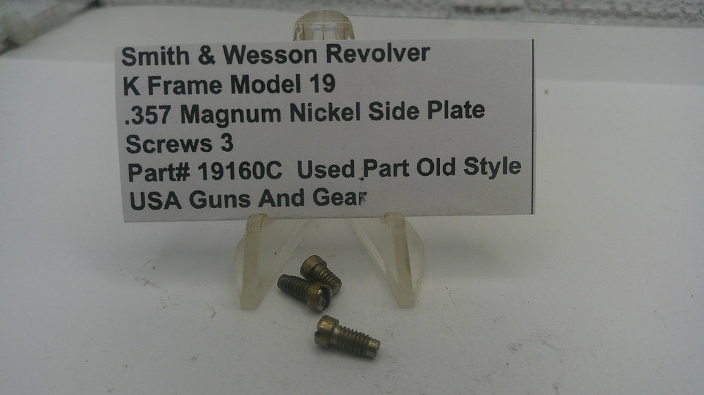 Smith & Wesson revolver parts with a label on a white background