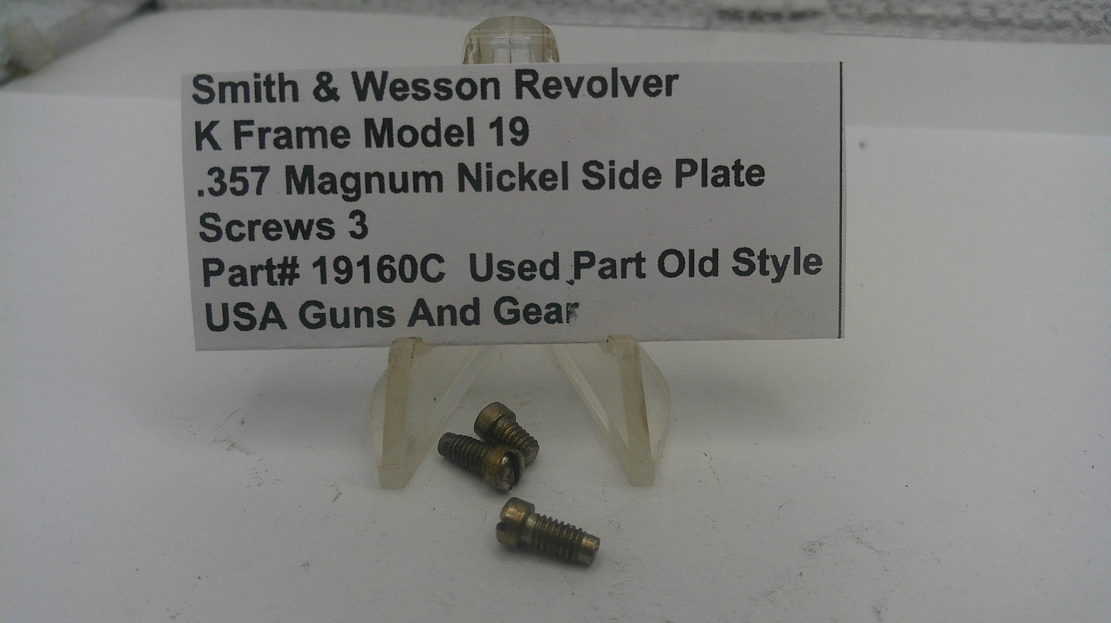 Smith & Wesson revolver parts with a label on a white background