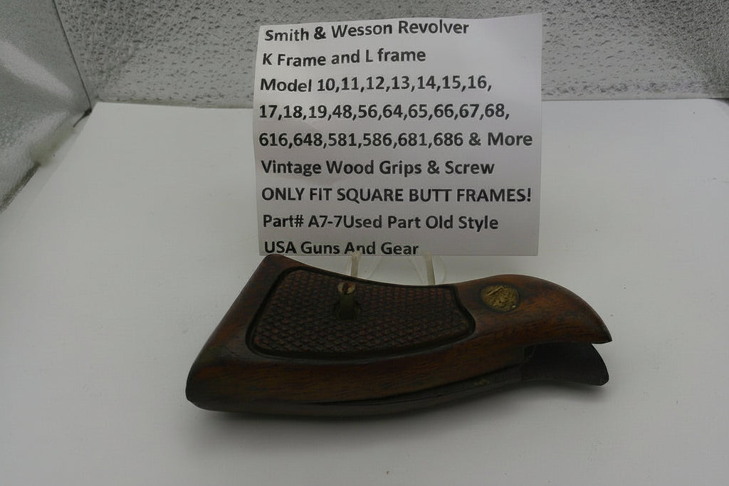 Brown gun holster with a sign detailing compatibility information on a white surface.