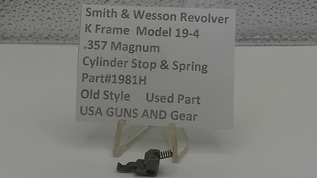 Smith & Wesson revolver part with descriptive label on a white background