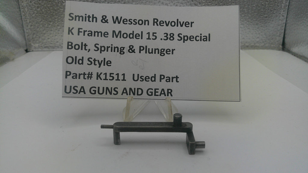 Smith & Wesson revolver part with descriptive label on a white background