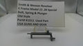 Smith & Wesson revolver part with descriptive label on a white background