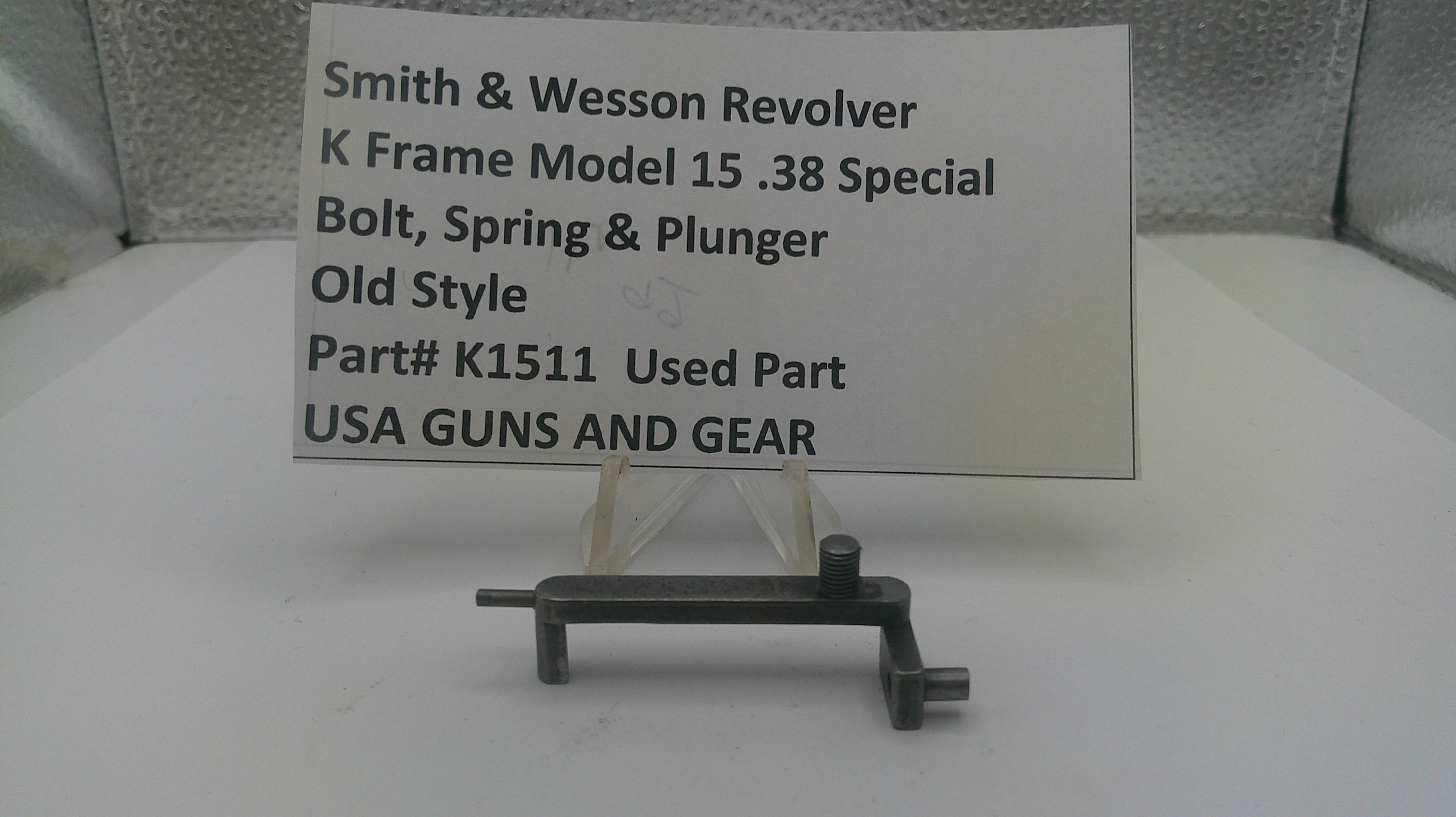Smith & Wesson revolver part with descriptive label on a white background