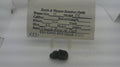 Smith & Wesson used blued thumb piece and nut, inventory reference K831, with identification card; fitment unverified
