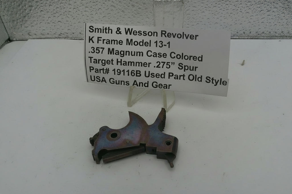 Smith & Wesson revolver part with descriptive label on a white surface