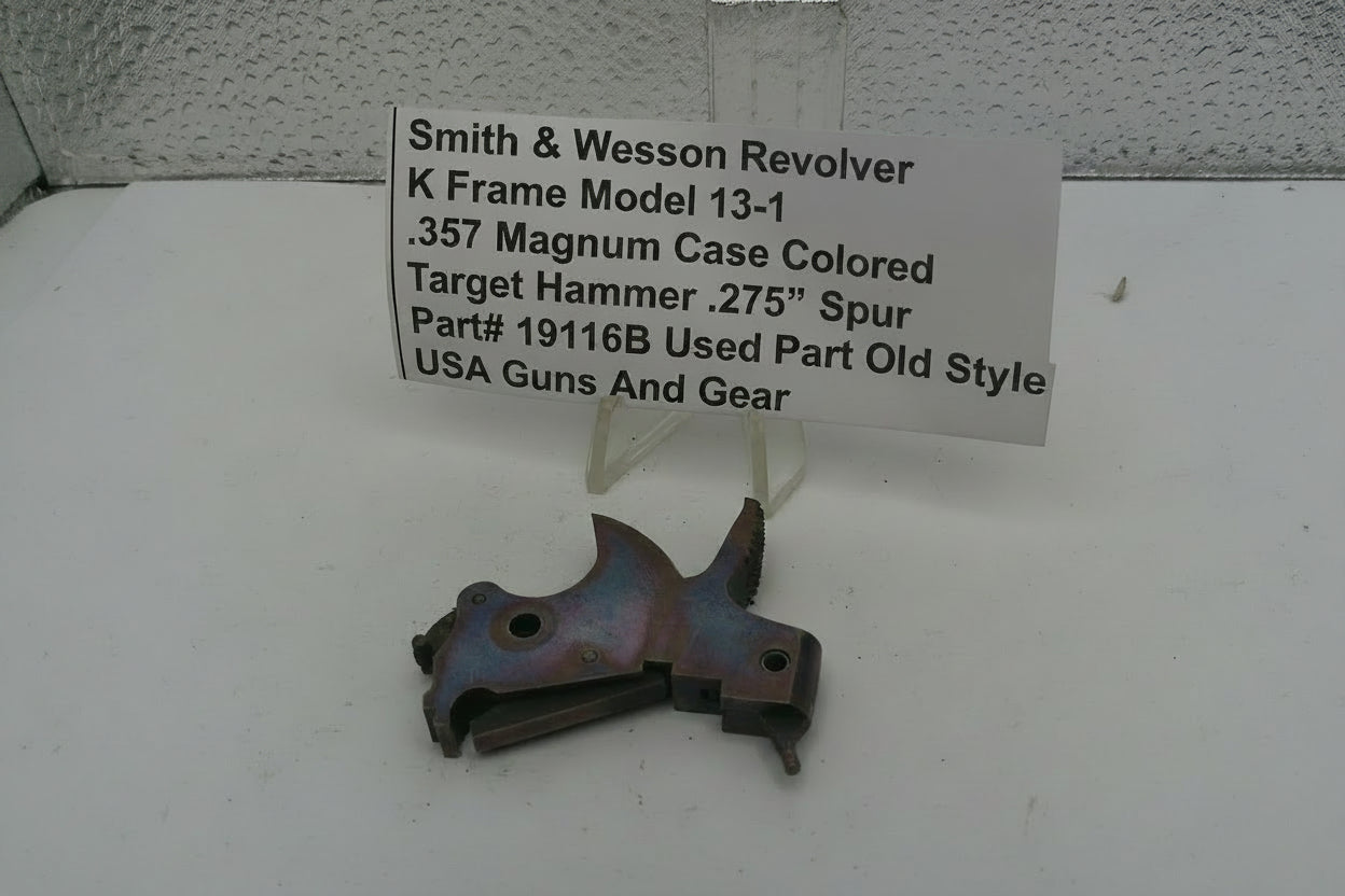 Smith & Wesson revolver part with descriptive label on a white surface