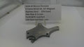 Smith & Wesson revolver part on a white surface with a label