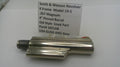 Smith & Wesson revolver barrel on a white background with a label.