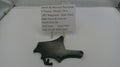 Smith & Wesson revolver part on a white surface with a label