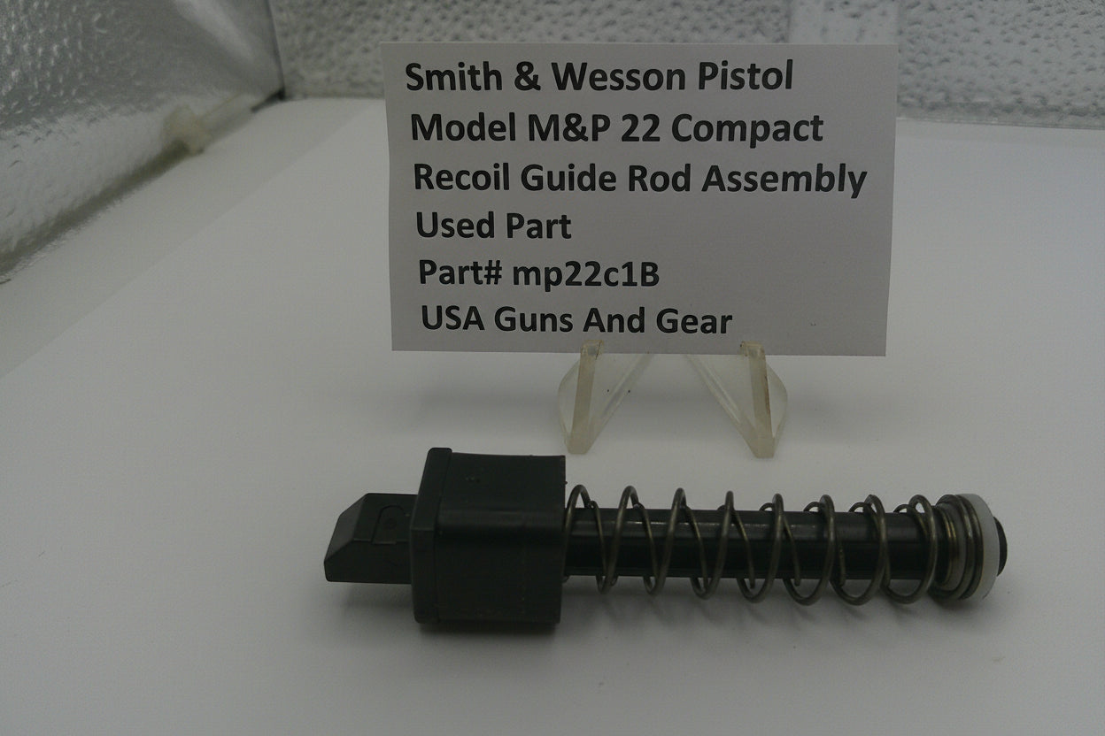 Smith & Wesson pistol recoil guide rod assembly with a label on a white surface