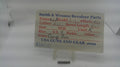 Smith & Wesson stainless steel revolver grip pin with identification card, used, inventory reference N205