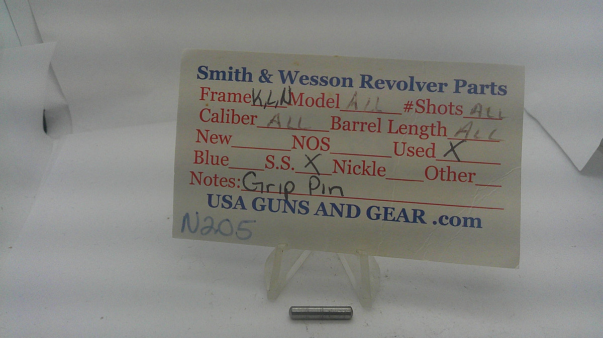 Smith & Wesson stainless steel revolver grip pin with identification card, used, inventory reference N205