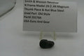Smith & Wesson revolver thumb piece and nut with a price tag on a white background