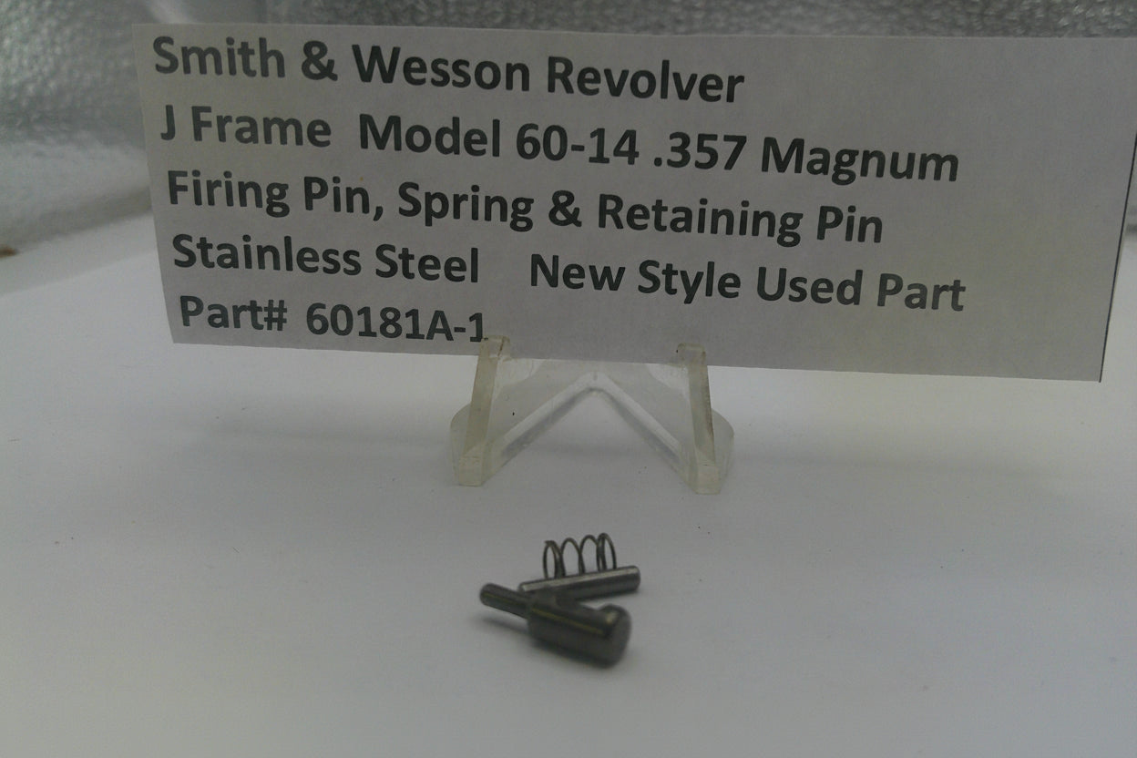Smith & Wesson revolver firing pin and spring on a white background with a label.