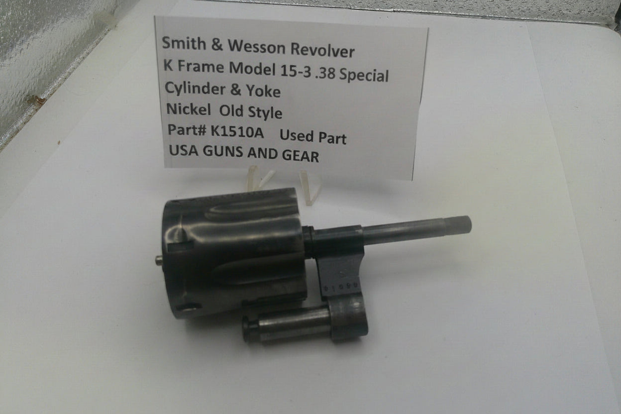 Smith & Wesson revolver part on a white background with a label