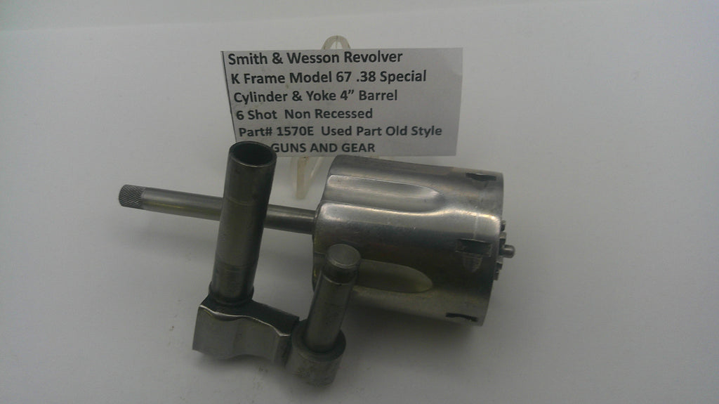 Smith & Wesson revolver part on a white background with a label.