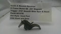 Smith & Wesson revolver trigger part with descriptive label on a white background