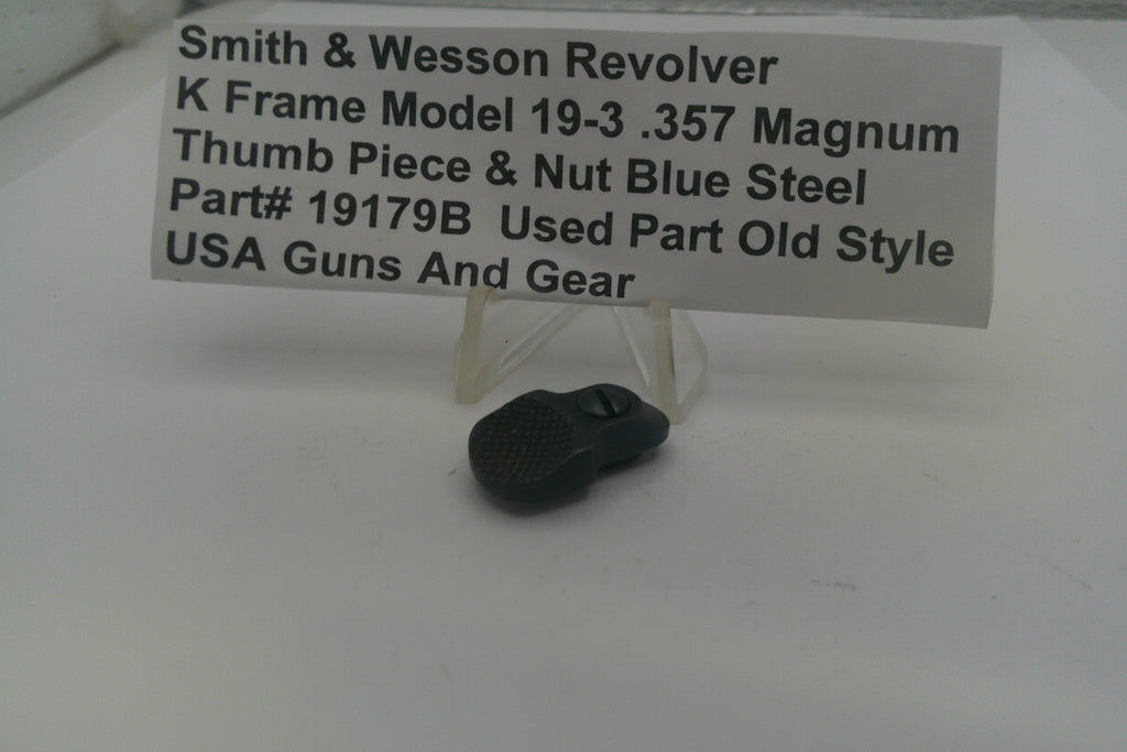 Black thumb piece and nut with a label detailing product information on a white background