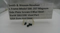Smith & Wesson revolver side plate screws with a label on a white background