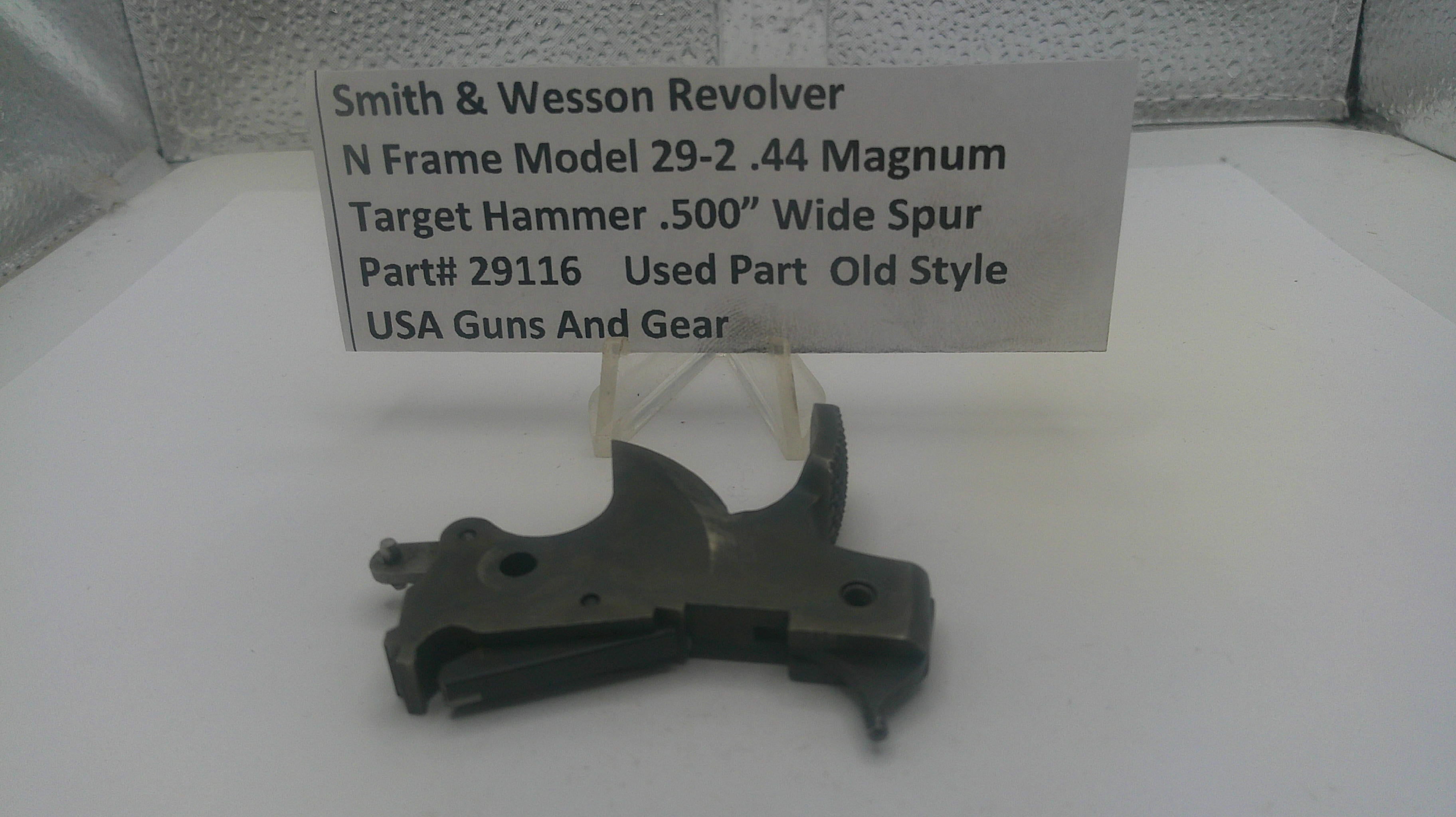 Smith & Wesson revolver part with a label on a white background
