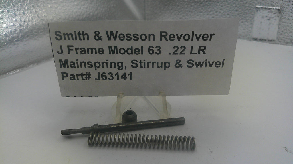Smith & Wesson revolver parts including mainspring, stirrup, and swivel on a stand with a label.