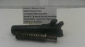 A black metal Smith & Wesson pistol slide assembly with a threaded barrel and recoil spring, displayed on a white surface with a text label in the background.
