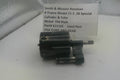 Smith & Wesson revolver cylinder and yoke on a white surface with a label.