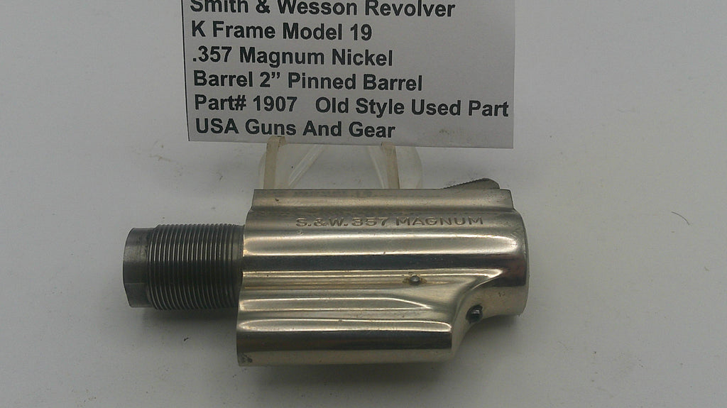 Smith & Wesson revolver barrel on a white background with a label.
