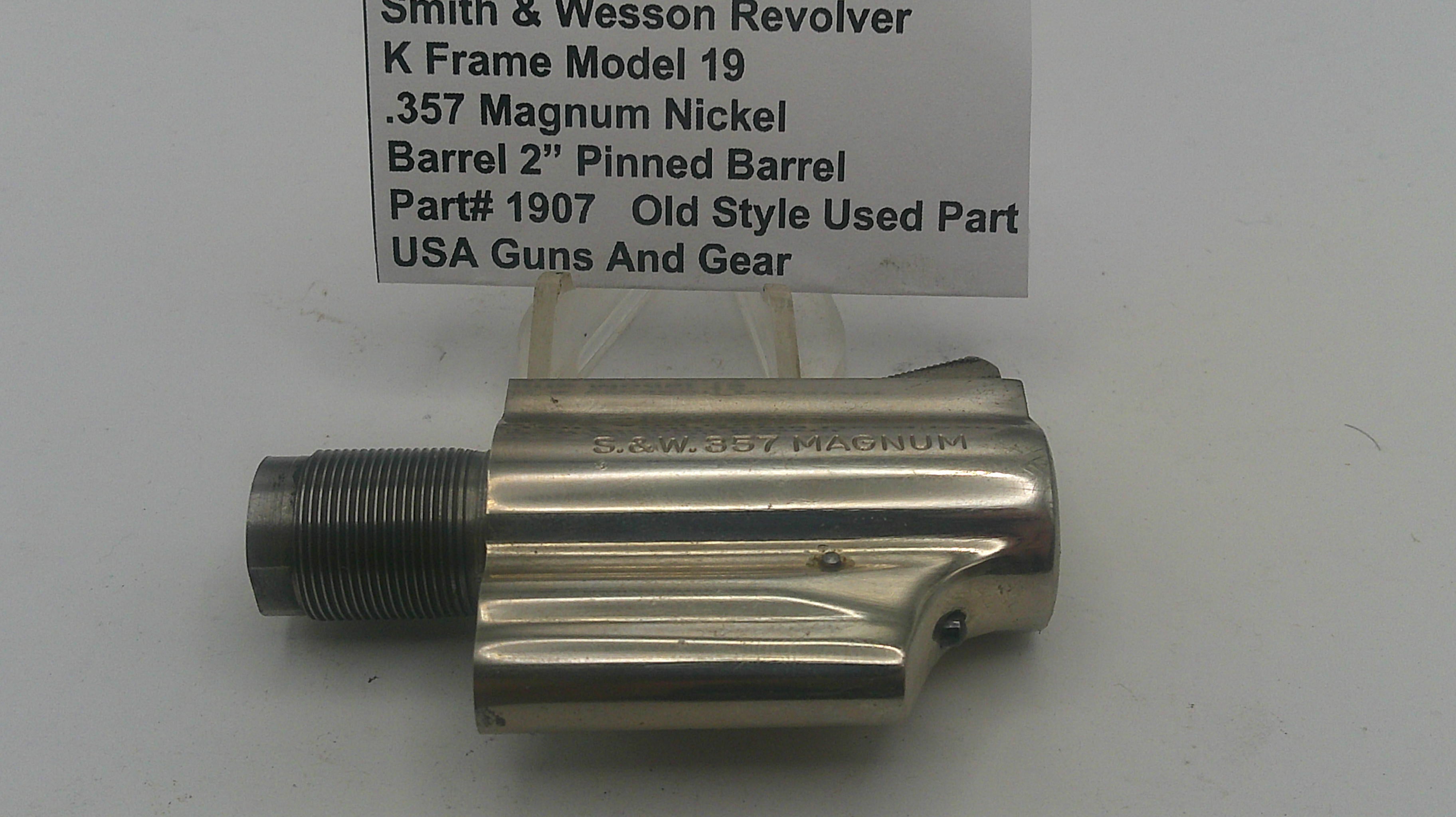 Smith & Wesson revolver barrel on a white background with a label.